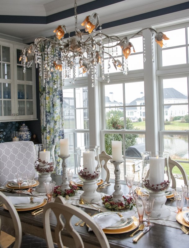 A palette of white and gold enhances the dining area in Patty and Greg Null’s home.